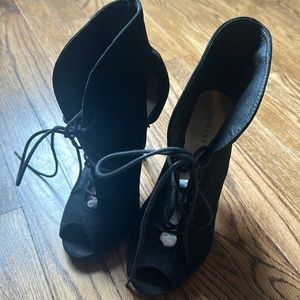 Gently used Black Chinese Laundry lace up heels/booties. Size 6